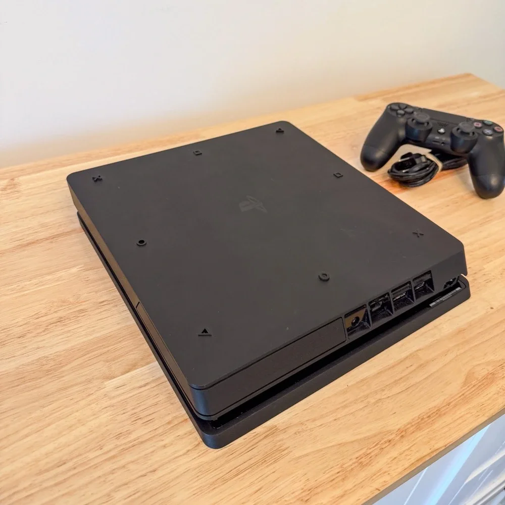 Sony PlayStation 4 Slim 1TB Console Black with DualShock 4 Controller